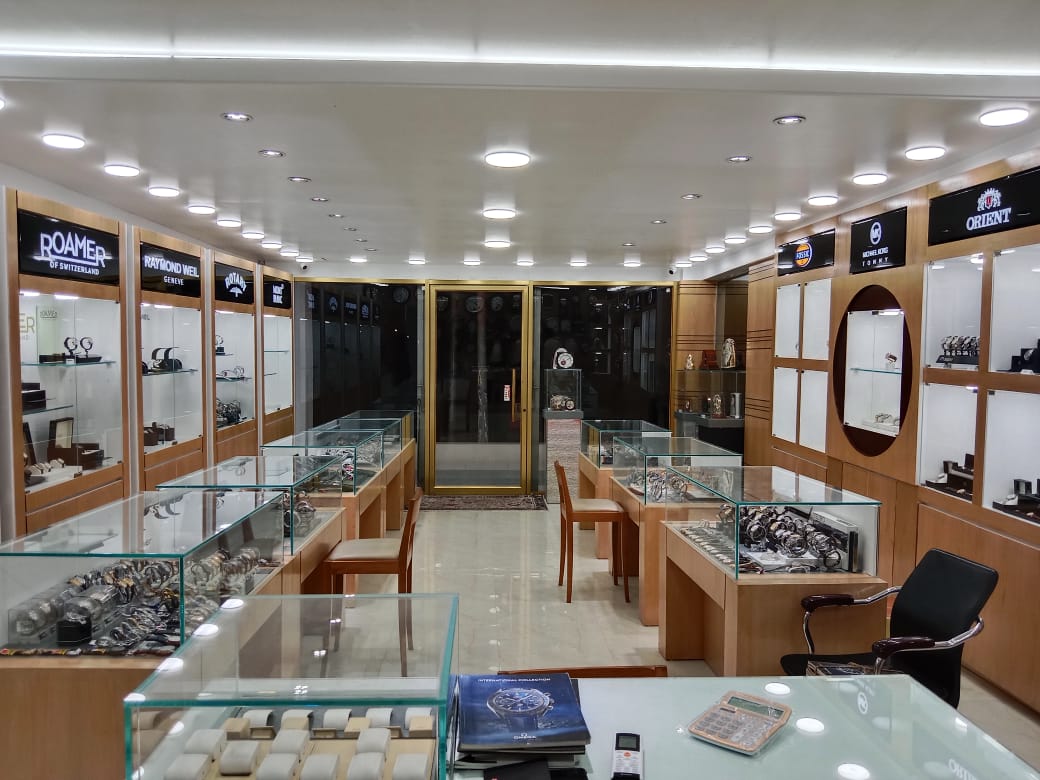 A watch movement being assembled by a watchmaker.